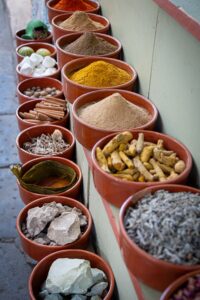 How to Buy Pure Spices Online: A Complete Guide Colorful baskets of spices displayed in Tunis market souk.